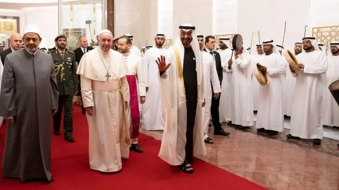 Pope Francis, Head of the Catholic Church is welcomed by Abu Dhabi's Crown Prince Mohammed bin Zayed Al-Nahyan and Sheikh Ahmed Mohamed el-Tayeb, Egyptian Imam of al-Azhar Mosque upon his arrival at Abu Dhabi International airport in Abu Dhabi